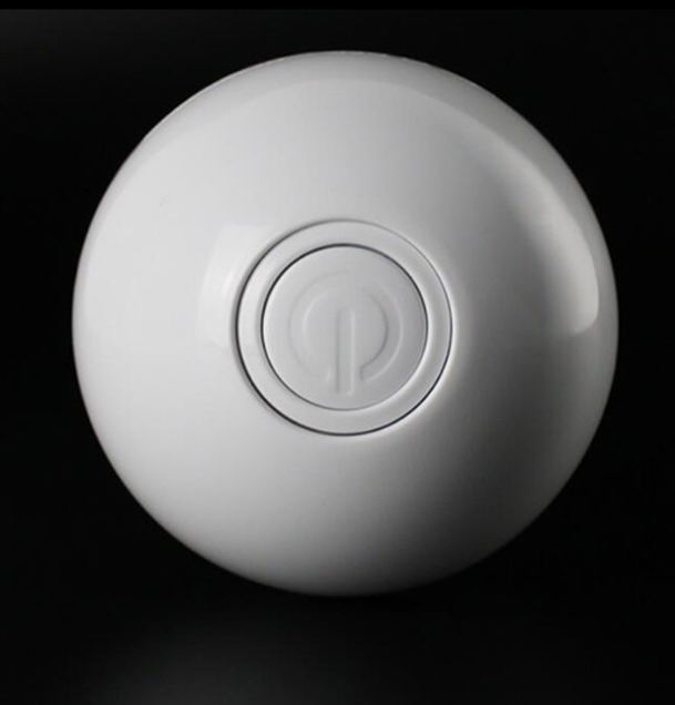 Power button on the white ball