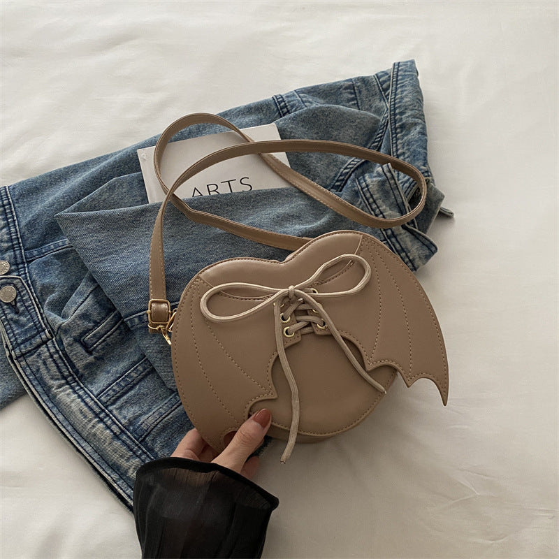 Bat-Wing Heart Crossbody Bag, khaki, with strap