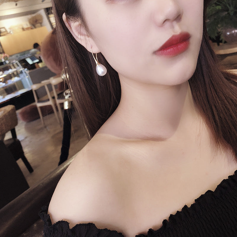 Waterdrop Pearl Earrings, worn
