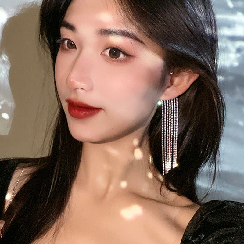 Rhinestone tassel ear cuff, worn, front