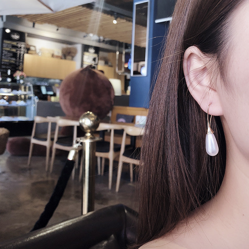 Waterdrop Pearl Earrings, worn, side view