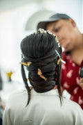 Butterfly hair clips styled in hair