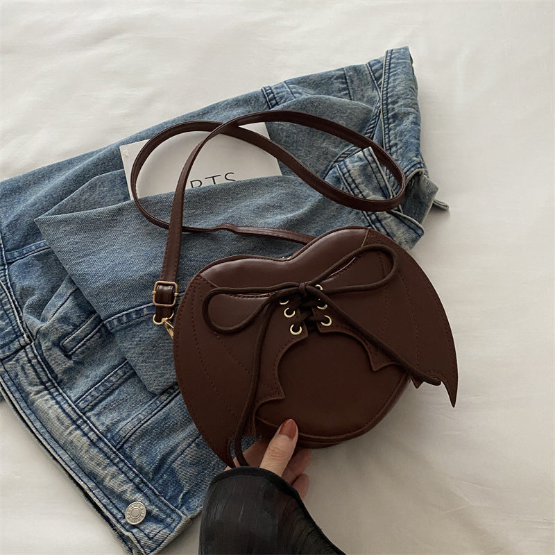 Bat-Wing Heart Crossbody Bag, brown, with strap