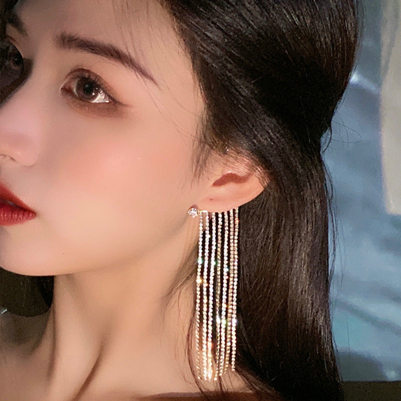 Rhinestone tassel ear cuff, worn